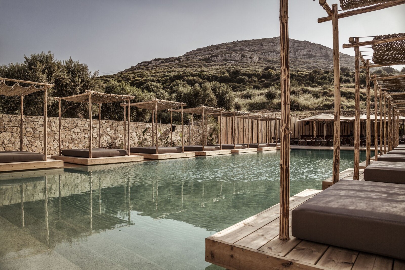 The boho chic pool of Doryssa Boutique Hotel, part of the group's luxury hotels in Samos