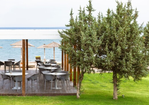 The al fresco beach bar at Doryssa Coast's beachfront luxury apartments in Samos