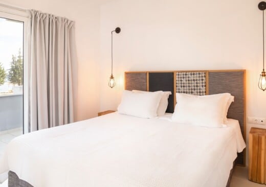 Bedroom of Doryssa Coast's seaview apartments in Samos