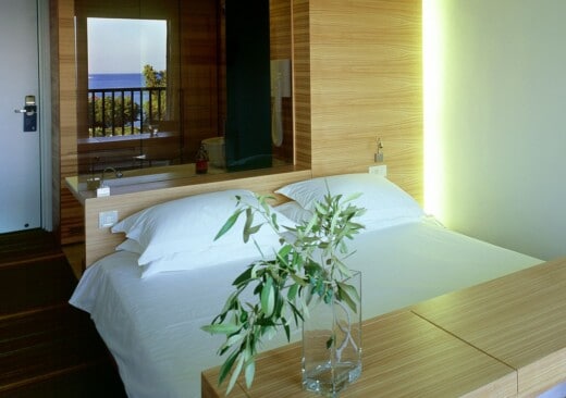 The bedroom of Doryssa Seaside's hotel room for two guests