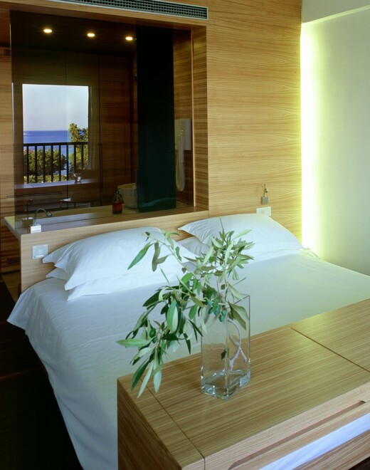 The bedroom of Doryssa Seaside's hotel room for two guests