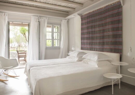 The bedroom of Doryssa Seaside Village beachfront luxury suite in Samos